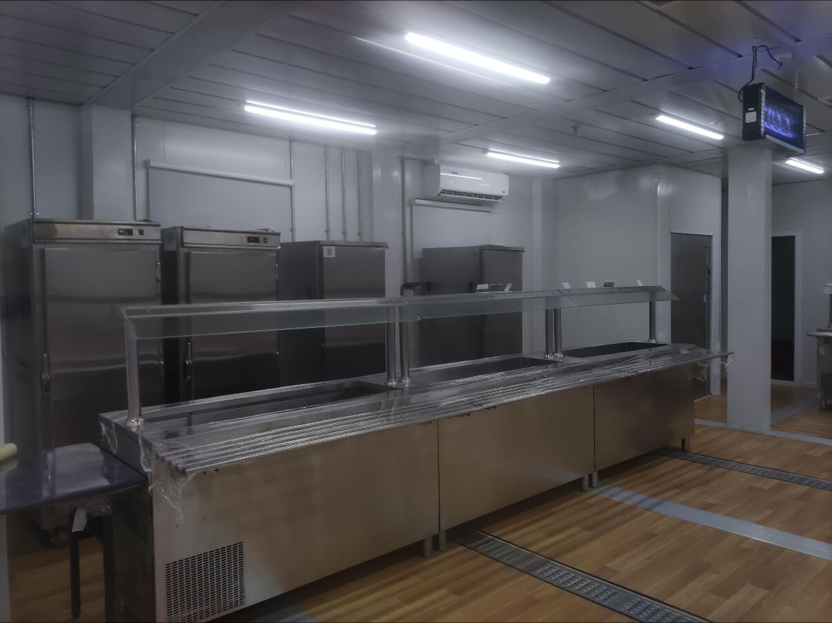 Mess hall servery counter with stainless-steel hot and cold service units