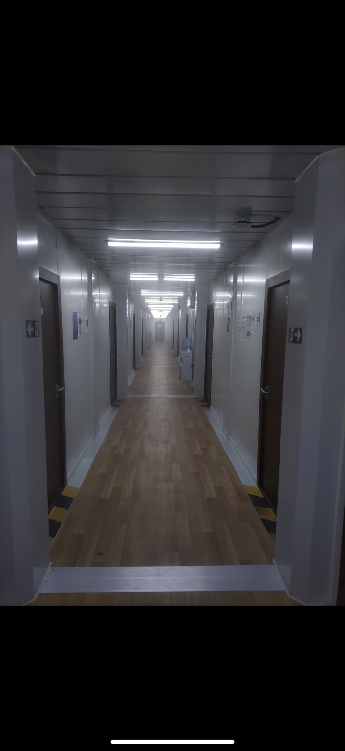 Room corridor inside a modular accommodation building