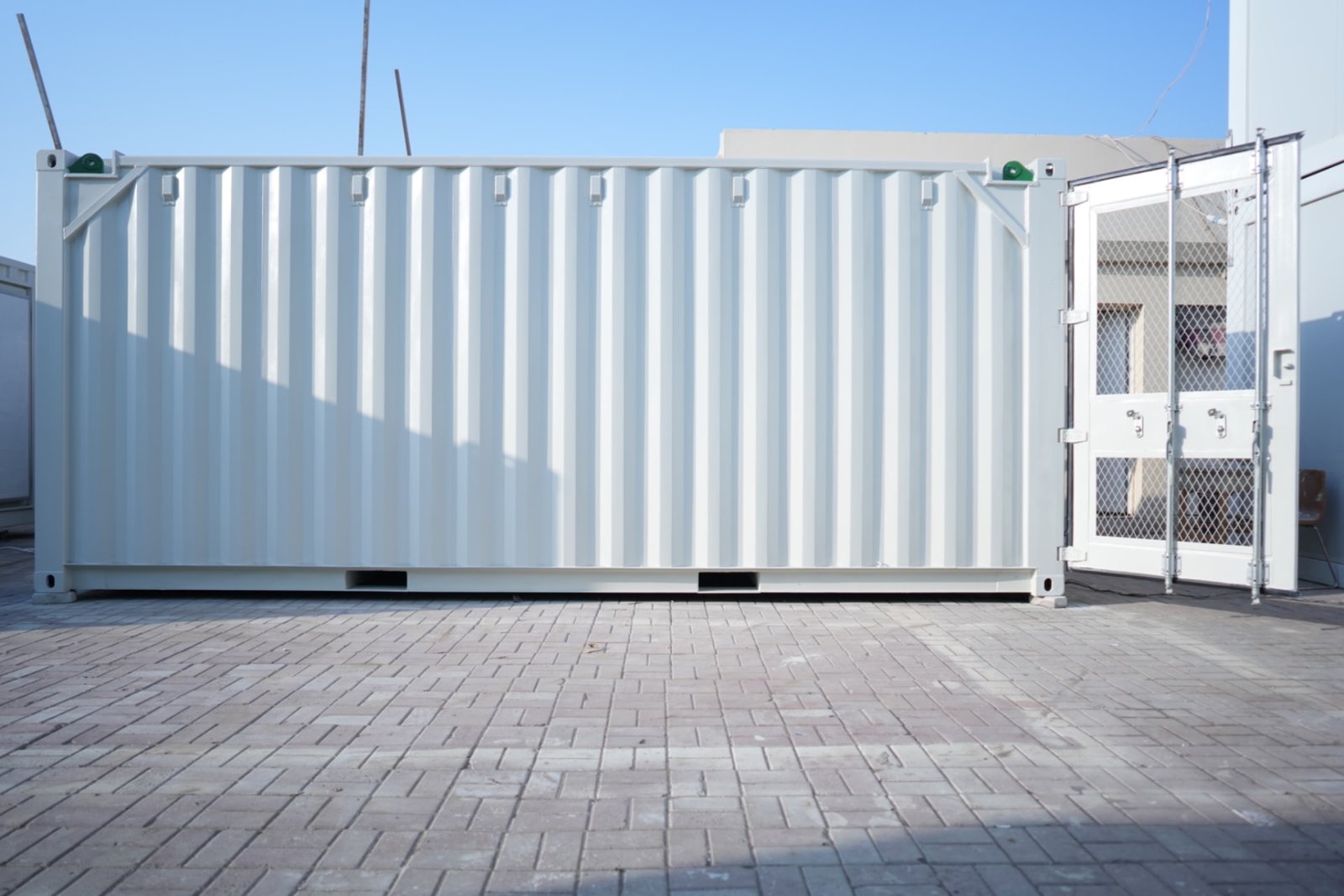 Side view of a ZAT Cabin cold room container with open mesh security gate